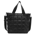 Chic black quilted tote bag with padded grid design and adjustable shoulder strap - Black