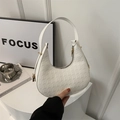 White houndstooth embossed semi-circular shoulder bag with elegant gold hardware - White