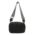 Black quilted puffer crossbody bag with a wide striped shoulder strap on white background - Black