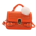Orange faux-crocodile mini handbag with gold twist lock and a white furry pompom charm - Orange