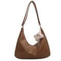 Brown semi-circle hobo bag with textured faux leather and pink plush charm accessory - Bag / Brown