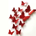 Set of 12 vibrant red 3D butterfly wall stickers with shiny metallic glitter texture - Multi-size Sets / Red Glitter