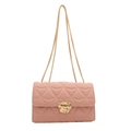 Elegant lotus pink quilted crossbody bag with gold chain strap and metallic twist lock - Pink