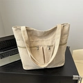 Beige corduroy tote bag with double front zippers and soft textured shoulder straps - Khaki
