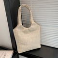 Chic cream woven tote bag with herringbone texture and minimalist shoulder strap design - Fishbone Pattern Style / Off White