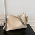 Creamy white hobo bag with vintage geometric jacquard strap and lychee texture - Off White