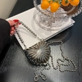 Silver heart-shaped metal evening bag with shell texture and beaded chain - Silver