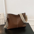 Brown litchi leather tote bag with geometric wide strap and white seam detail - Dark Brown