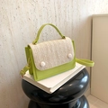 Light green woven flap crossbody bag with white buckles and adjustable shoulder strap - Green