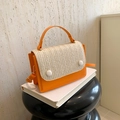 Orange woven crossbody flap bag with large white buttons and adjustable shoulder strap - Orange Red