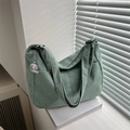Detail of light green corduroy dumpling bag with soft texture and a cute sheep pendant - With Pendant / Light Green