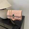 Pink quilted crossbody bag with gold chain strap and rectangular turn-lock closure - Pink