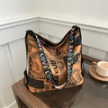 Orange newspaper print tote bag with black LOVE lettered straps for casual daily use - Dark Brown