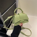 Mini lime green crocodile pattern crossbody bag with curved handle and gold hardware - Green