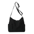 Bolso bandolera minimalista de nailon negro con diseño multibolsillo y correa ajustable - Negro