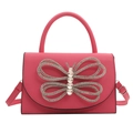 Bolso bandolera rosa con gran decoración de mariposa en diamantes de imitación y asa - Rosa intenso