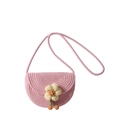 Pink woven saddle bag for girls featuring a 3D plush flower and soft braided shoulder strap - Pink