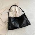 Classic black soft leather tote bag with embossed lettering and stylish knot detail - Black
