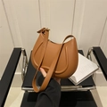 Minimalist brown half-moon underarm bag with curved embossing and gold hardware - Brown