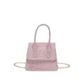 Mini shiny pink crossbody bag with a metallic chain strap and textured flap finish - Pink
