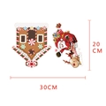 Detail view of 30x20cm Christmas wall stickers featuring gingerbread house and Santa Claus - Santa Sleigh Gingerbread House (Y1550)