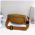 Detail of mustard yellow canvas waist bag with braided zipper pull and plastic buckle - Ginger Yellow