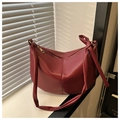 Minimalist burgundy faux leather crescent tote bag with knotted shoulder strap detail - Burgundy