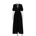 Close-up of black V-neck dress featuring puff sleeves and detailed front button closure - S / Black