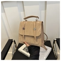 Close-up of beige crossbody bag with pleated texture and stylish double buckle design - With Pendant / Khaki