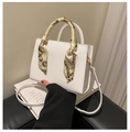 Elegant white square crossbody bag with decorative silk scarf handle and gold hardware - White