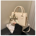 Chic beige square crossbody bag with decorative silk scarf handle and detachable strap - Off White