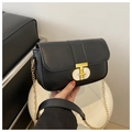 Detail of elegant black square crossbody bag with gold oval clasp and chain strap - Black