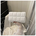 White quilted crossbody bag for women with minimalist flap design and sleek shoulder strap - White