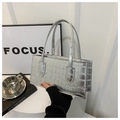 Detail of silver rectangular handbag with crocodile texture and double top handles - Silver