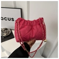 Magenta quilted crossbody bag with gold chain strap and spherical pendant detail - Rose Pink