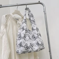Witte canvas shopper met zwarte vlinderborduring en details met franjes - Zwart