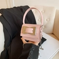 Pale pink mini handbag with a golden bow buckle and slim silver metal chain strap - Pink
