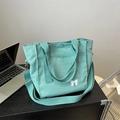 Grande borsa tote in tela verde menta con stampa fiocco e tracolla regolabile - Verde