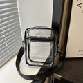 Transparent PVC crossbody bag with black trim and adjustable nylon shoulder strap - Black