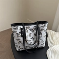 Cream tote bag with black and gold butterfly embroidery and black leather straps - Black