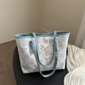 Elegant white tote bag with blue and gold butterfly embroidery and blue leather straps - Blue