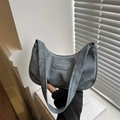 Deep grey suede shoulder bag with crescent shape and fashion logo detail - Blue
