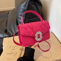 Fuchsia quilted leather underarm bag featuring a crystal-encrusted buckle and strap - Rose Pink