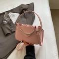 Pink heart-shaped crossbody bag with silver bead chain and smooth PU leather finish - Pink
