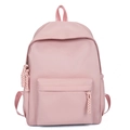 Minimalist soft pink nylon backpack with front zipper pocket and woven knot details - Pink