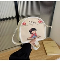 Beige canvas crossbody bag with cute girl illustration and zen text on wooden table - Lucky Girl Style (200)