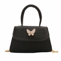 Mini borsa a tracolla nera con fibbia a farfalla oro bianco e catena dorata - Nero