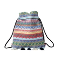 Ethno-Beuteltasche im Boho-Stil mit bunten Webmustern und dekorativen Quasten am Rand - Blau Und Rot
