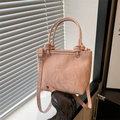 Pink textured leather tote bag with knotted handles and adjustable crossbody strap - Pink
