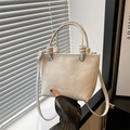 Beige faux leather tote bag with knotted handles and adjustable shoulder strap - White